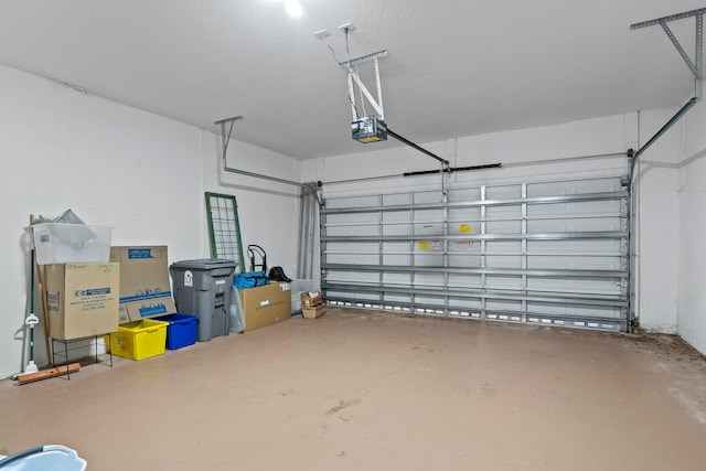 garage featuring a garage door opener