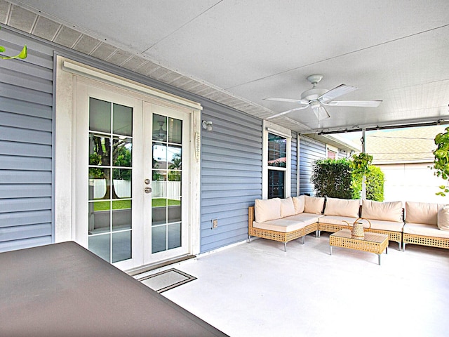 view of patio / terrace featuring an outdoor living space, ceiling fan, and french doors