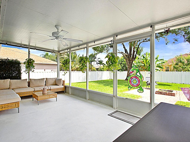 222 SW Starfish Ave, Port Saint Lucie, FL 34984 - sunroom / solarium with a ceiling fan and outdoor lounge area