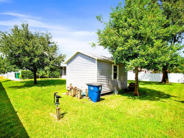 222 SW Starfish Ave, Port Saint Lucie, FL 34984 - view of yard featuring an outdoor structure