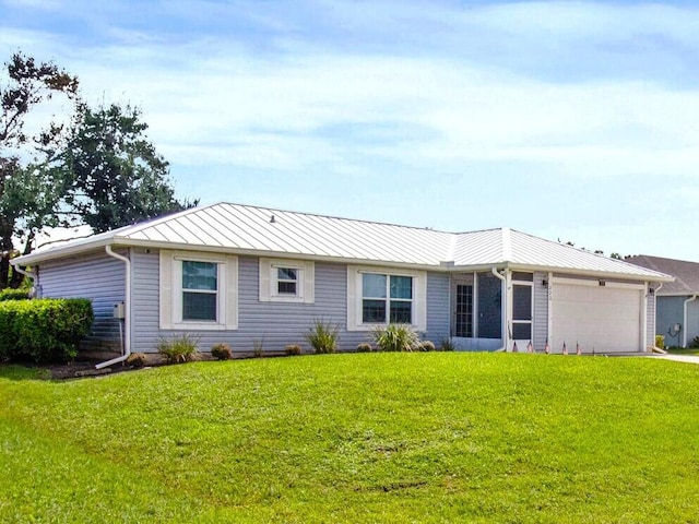 ranch-style house with a front yard and a garage