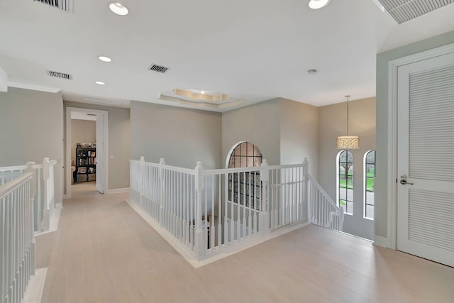 16106 Rosecroft Ter, Delray Beach, FL 33446 - hall featuring visible vents, recessed lighting, wood finished floors, an upstairs landing, and baseboards