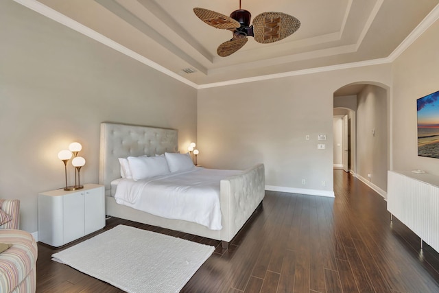 16106 Rosecroft Ter, Delray Beach, FL 33446 - bedroom with a ceiling fan, visible vents, a raised ceiling, arched walkways, and wood finished floors