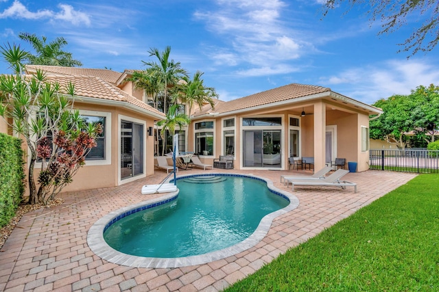 view of pool featuring a patio