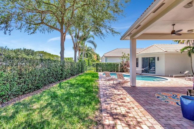 16106 Rosecroft Ter, Delray Beach, FL 33446 - exterior space with ceiling fan, a yard, a fenced backyard, a patio area, and a fenced in pool