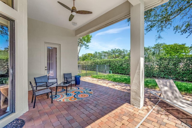 16106 Rosecroft Ter, Delray Beach, FL 33446 - view of patio / terrace with fence and a ceiling fan