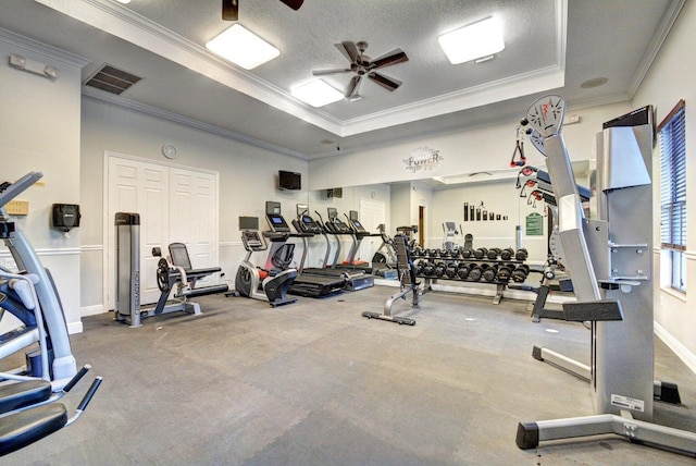 16106 Rosecroft Ter, Delray Beach, FL 33446 - workout area featuring a raised ceiling, ceiling fan, ornamental molding, and visible vents