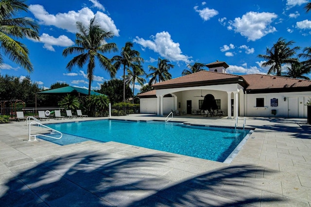 16106 Rosecroft Ter, Delray Beach, FL 33446 - pool featuring a patio area, fence, and a ceiling fan
