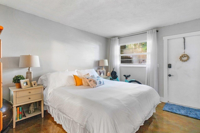 bedroom featuring a textured ceiling