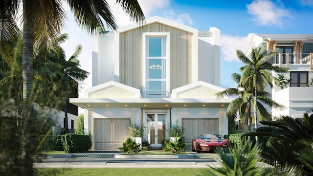 rear view of house with stucco siding and french doors