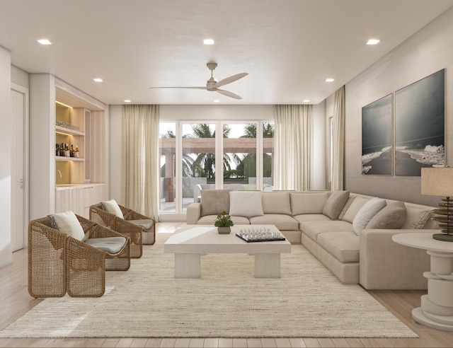 living area featuring built in features, recessed lighting, ceiling fan, and wood finished floors