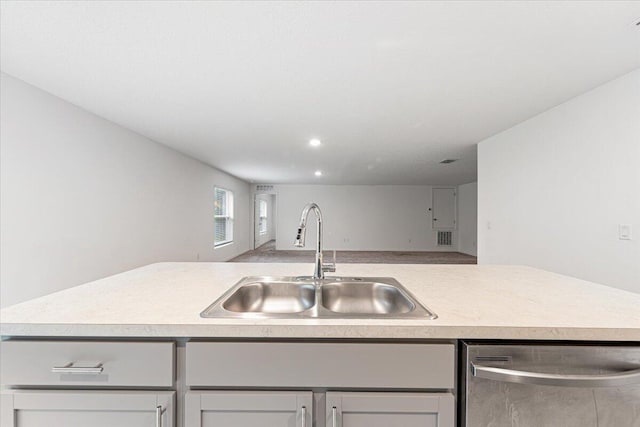 kitchen with stainless steel dishwasher and sink