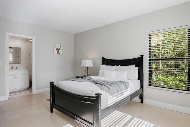 tiled bedroom with connected bathroom