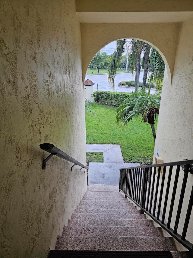 stairs featuring a water view