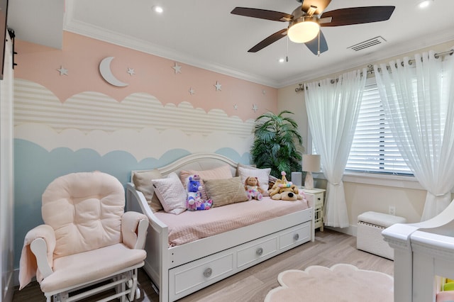 interior space with ornamental molding, light hardwood / wood-style flooring, and ceiling fan