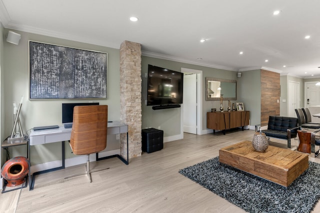 living room featuring crown molding and light hardwood / wood-style floors