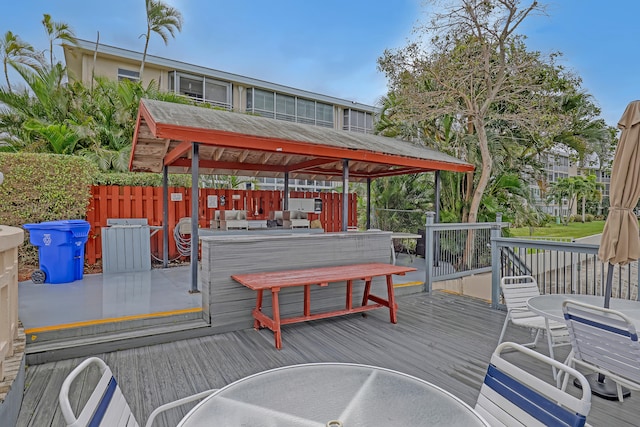 wooden terrace with a gazebo