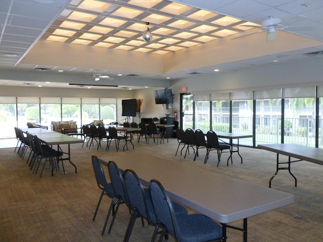 dining room with carpet flooring and ceiling fan