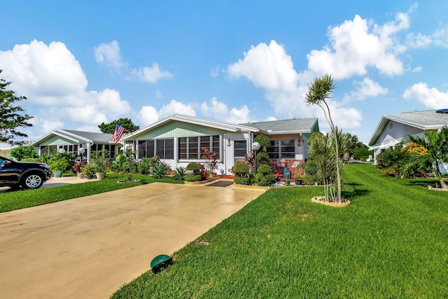 ranch-style house with a front yard