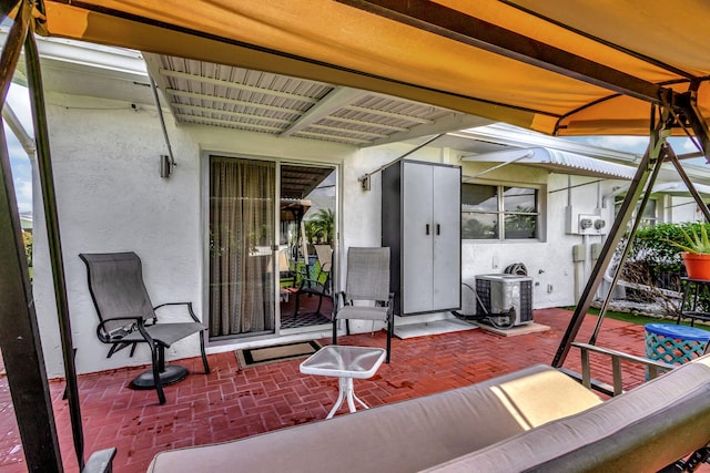 view of patio / terrace with central AC unit