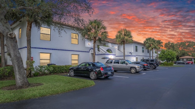 view of outdoor building at dusk