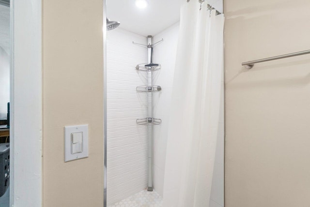 bathroom with a shower with curtain