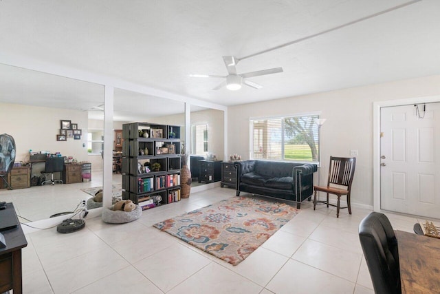 tiled living room featuring ceiling fan