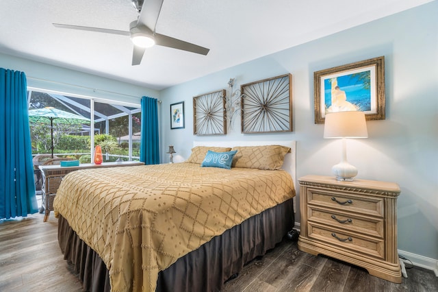 bedroom featuring dark wood-type flooring and ceiling fan