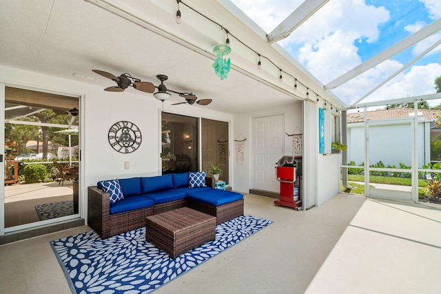 view of patio featuring outdoor lounge area and ceiling fan