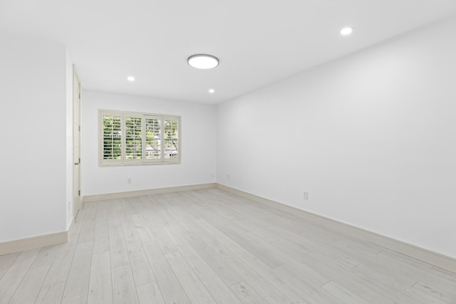 empty room with light wood-type flooring