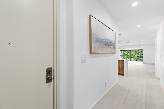 hall featuring light hardwood / wood-style flooring