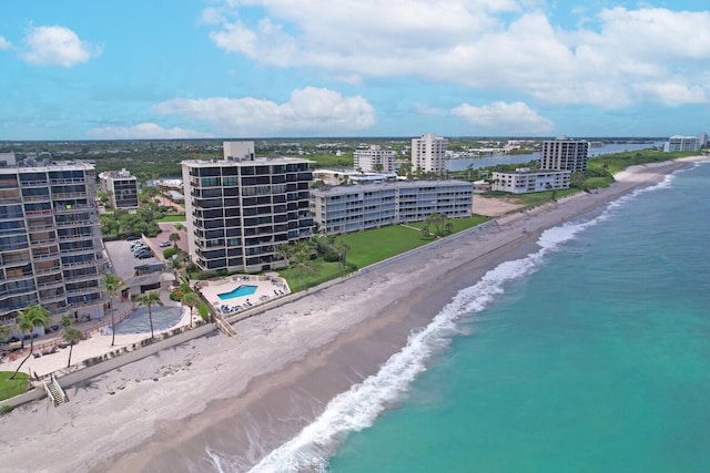 aerial view with a view of the beach and a water view