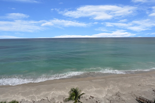 view of water feature with a beach view