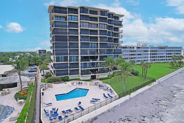 view of property featuring a community pool