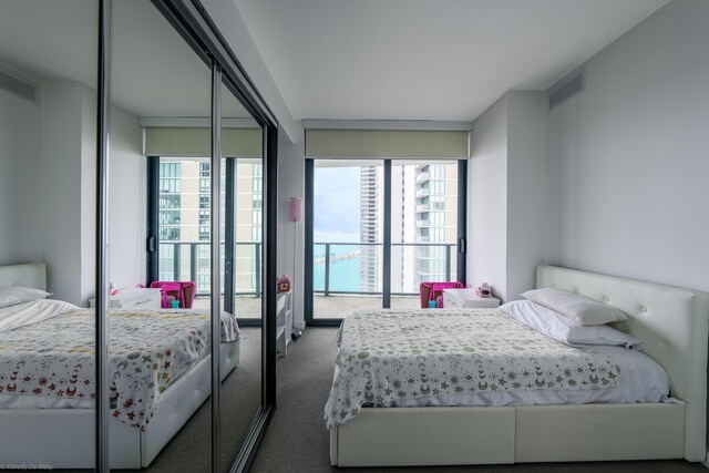 bedroom featuring carpet flooring