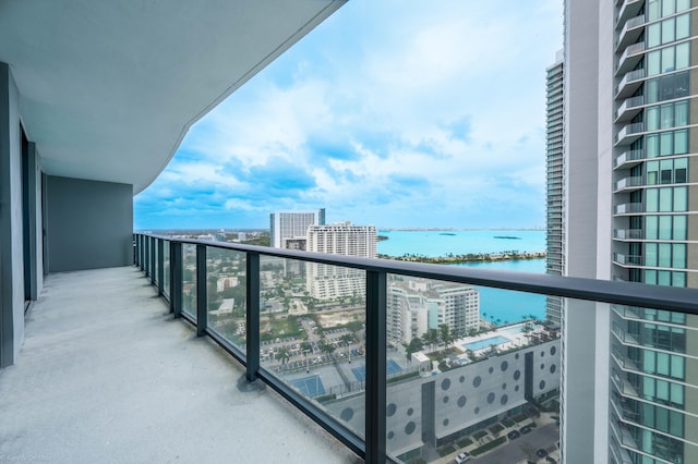 balcony featuring a water view