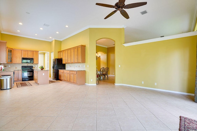 kitchen with backsplash, light stone countertops, black appliances, ceiling fan, and ornamental molding