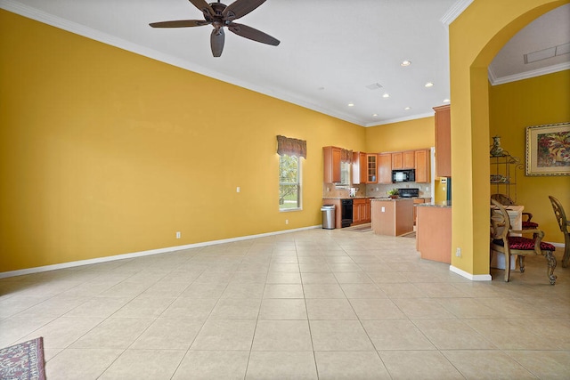 unfurnished living room featuring ornamental molding, light tile patterned floors, and ceiling fan