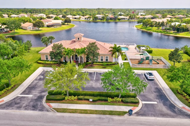 drone / aerial view with a water view