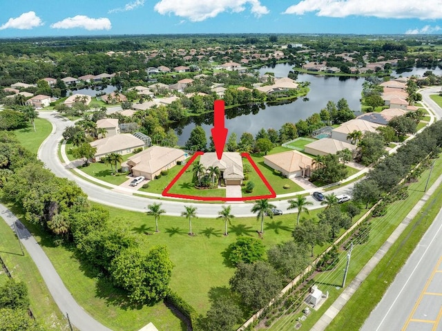 birds eye view of property featuring a water view