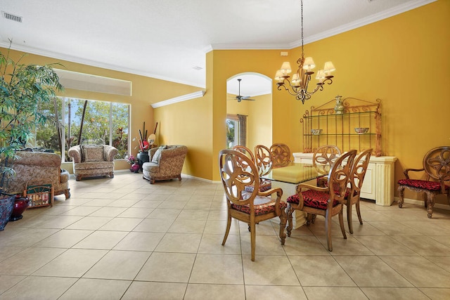 tiled dining space with an inviting chandelier and ornamental molding