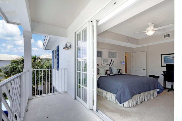 bedroom featuring ceiling fan and access to exterior