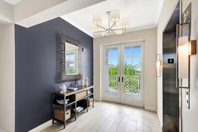 doorway with french doors, a notable chandelier, crown molding, and a healthy amount of sunlight