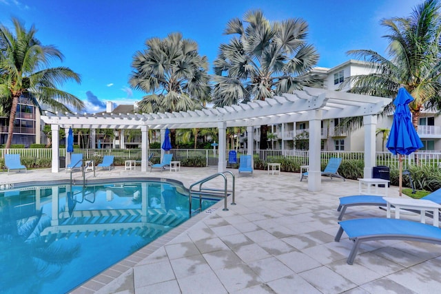 view of pool with a patio area and a pergola