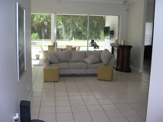 tiled living room featuring ornamental molding