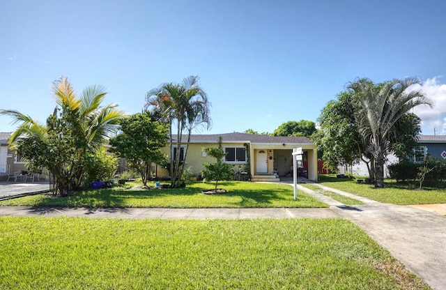 ranch-style house with a front yard