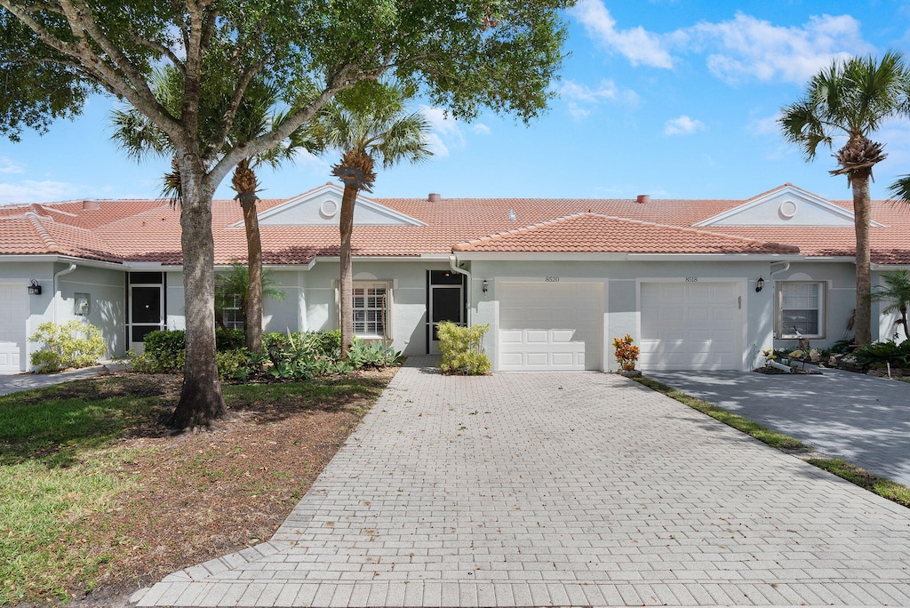 view of front of property featuring a garage