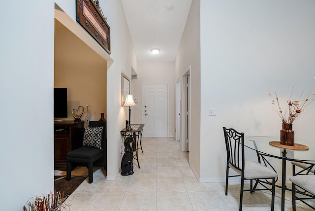 corridor with light tile patterned floors