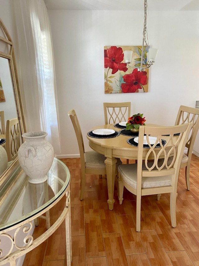 dining room with light wood-type flooring