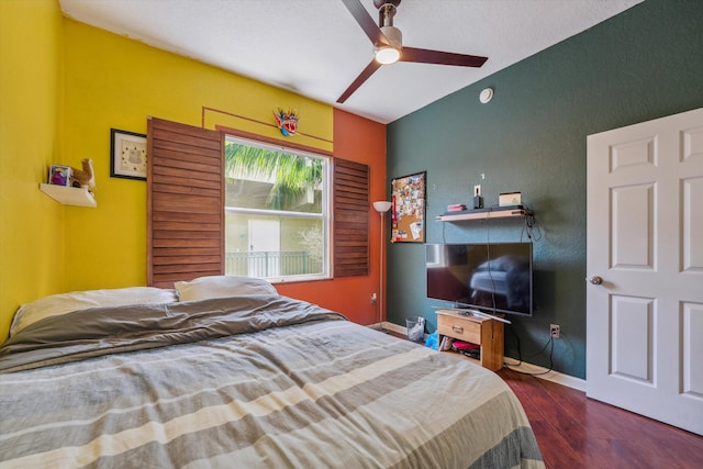 bedroom with hardwood / wood-style flooring and ceiling fan